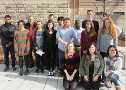 students pose together for a group photo