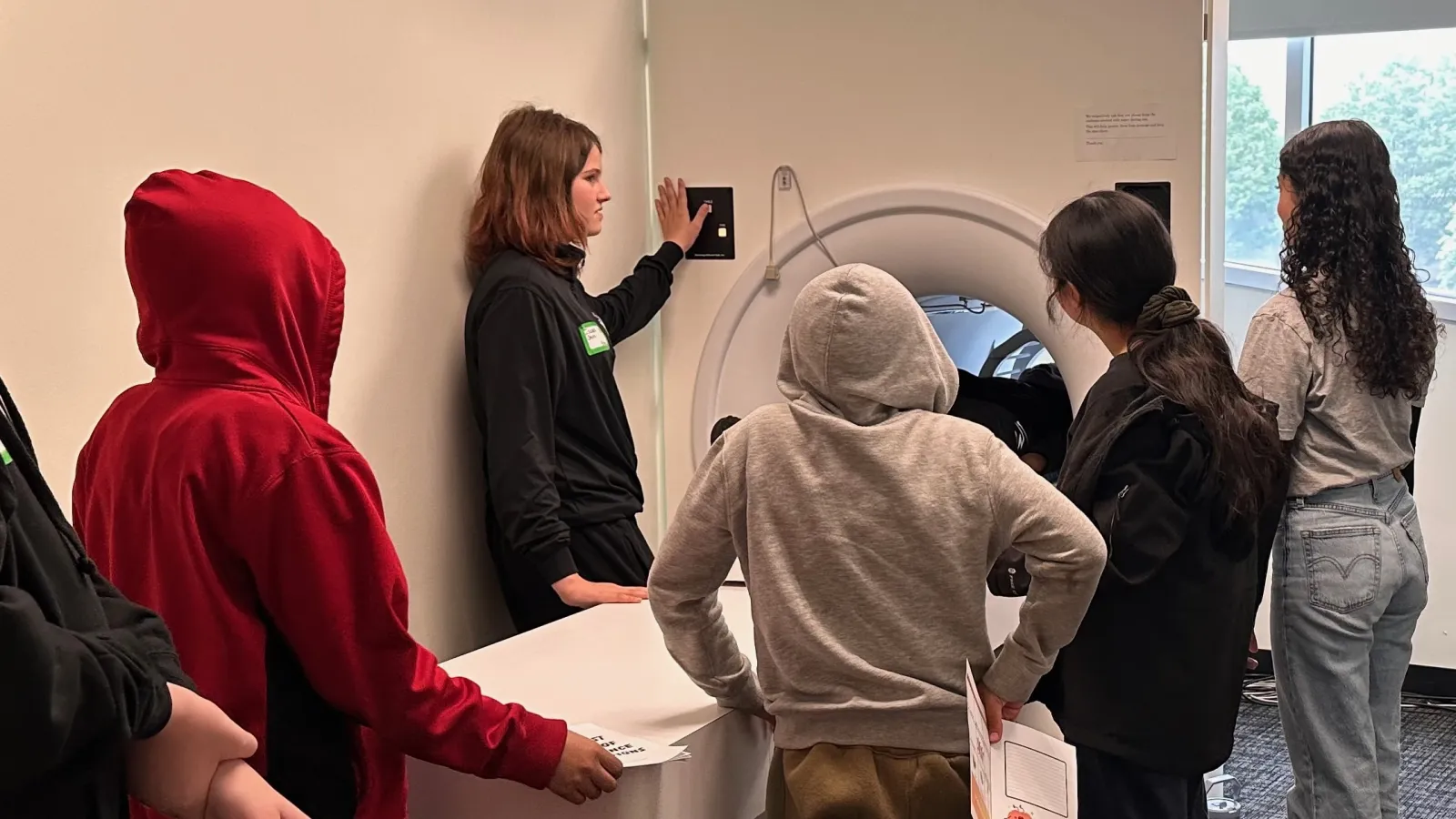 Students checking out the mock scanner