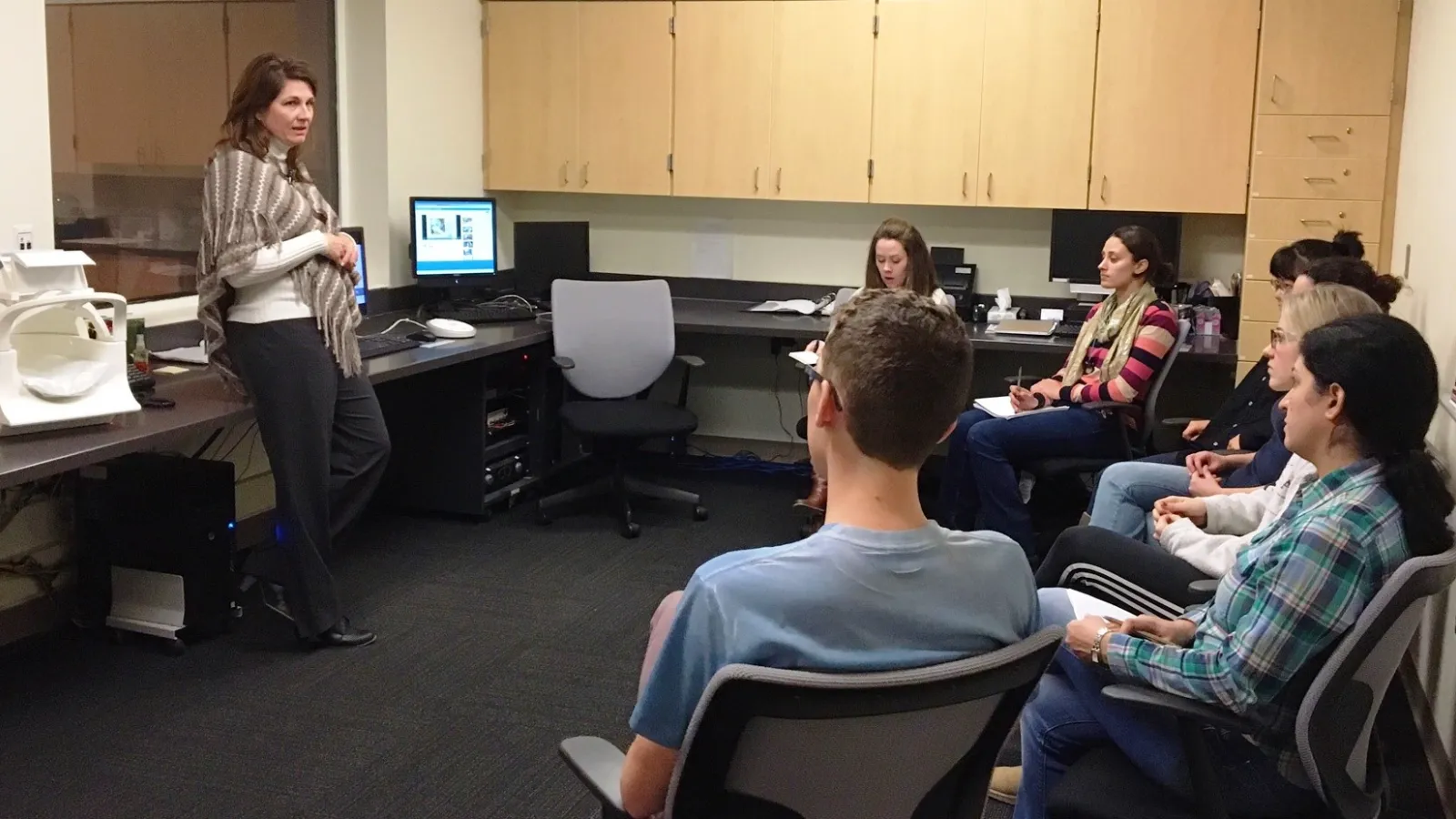 MRI Technologist Deborah Hardesty conducts an fMRI safety training