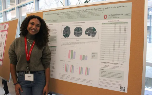 Sophie at her poster