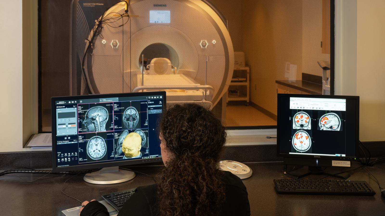 Person sitting in front of computer