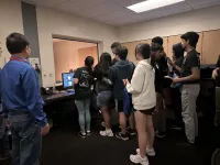 Students observing the MRI